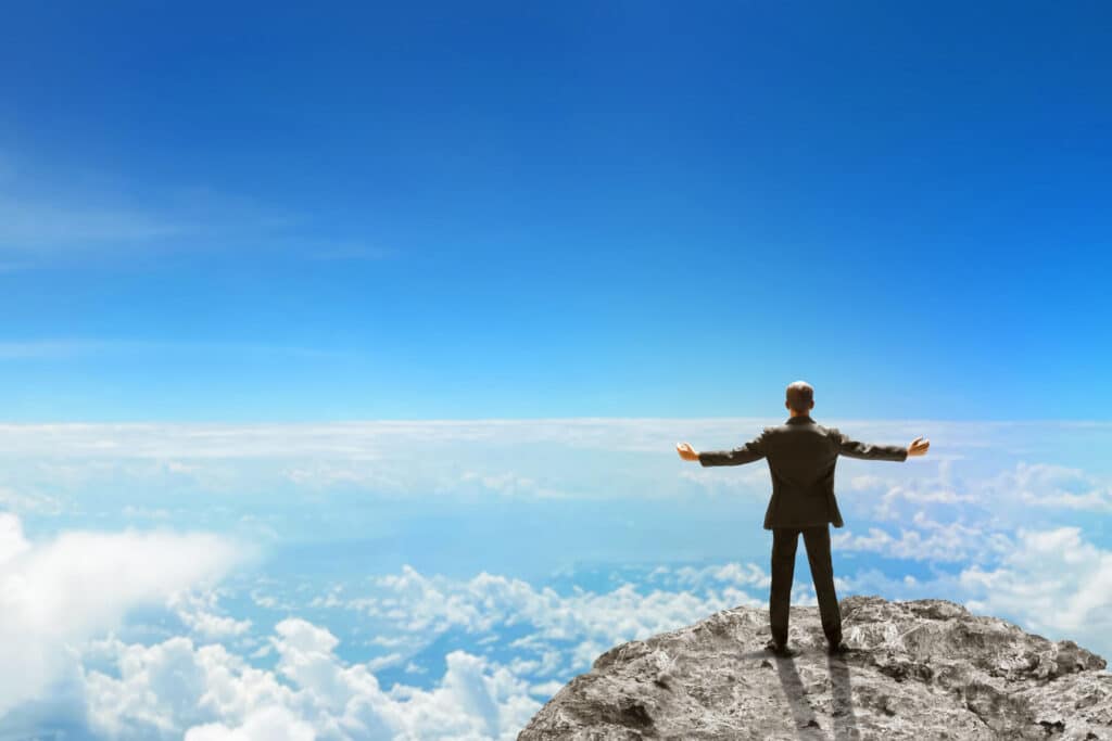 Business man looking on top mountain 3d illustration